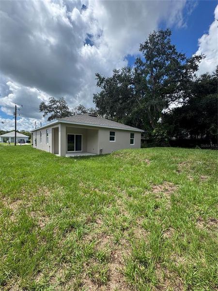 Exterior details and patio area of a home in , Auburndale (Image 23).