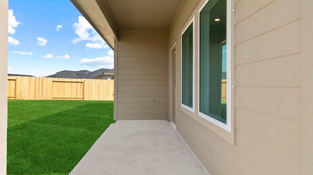 Exterior details and patio area of a home in Tamarron, Fulshear (Image 2).