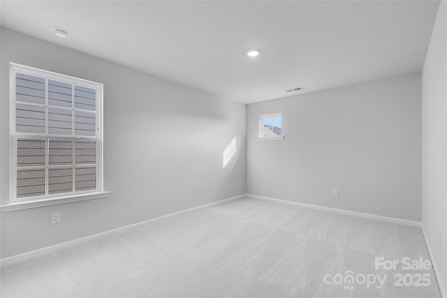 Spacious, unfurnished interior of a new home in Redhawk: Walk, Belmont (Image 25).