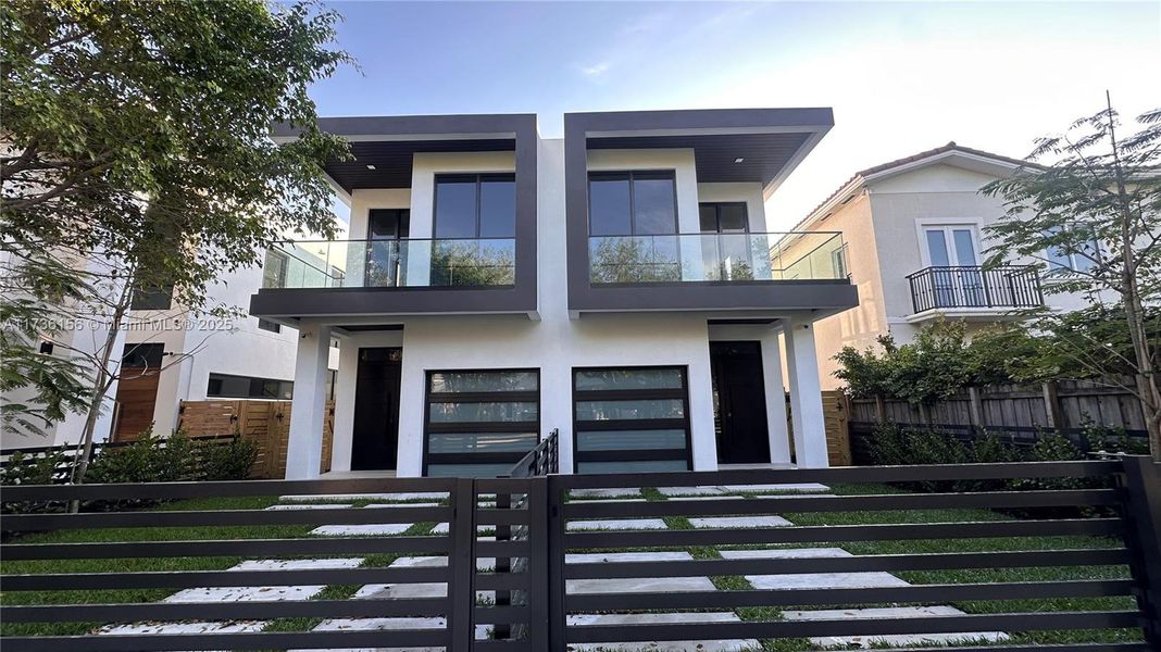 Front exterior of a new home in , Miami, FL, highlighting curb appeal (Image 1).