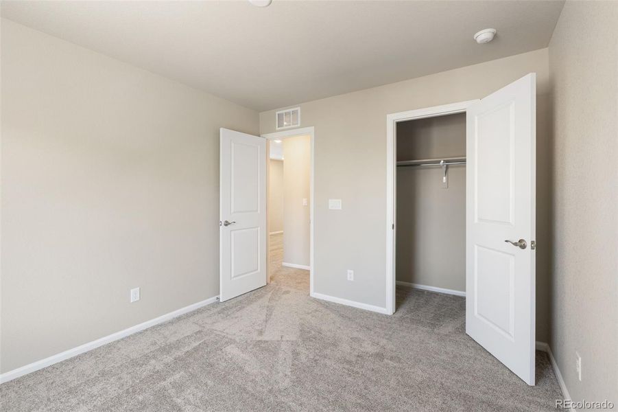 Spacious, unfurnished interior of a new home in Woodrose at Painted Prairie, Aurora (Image 19).