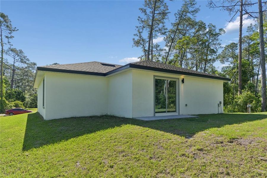 Exterior details and patio area of a home in , Deland (Image 24).