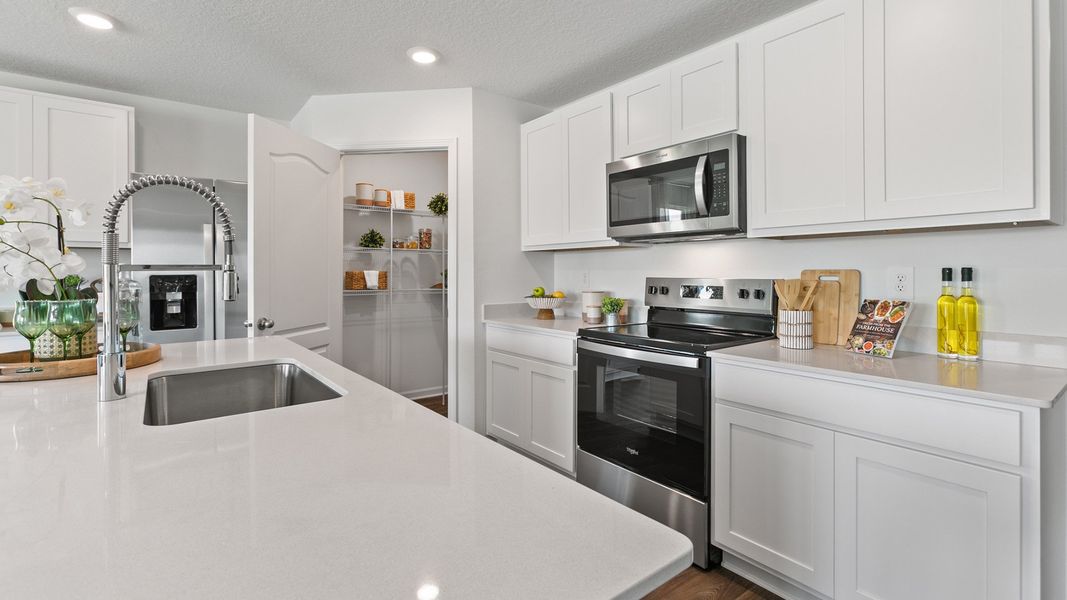 Representative furnished interior of a home built from the CALI by D.R. Horton in Rookery, Green Cove Springs (Image 5). Representative furnished interior of a home built from the CALI by D.R. Horton in Rookery, Green Cove Springs (Image 5).