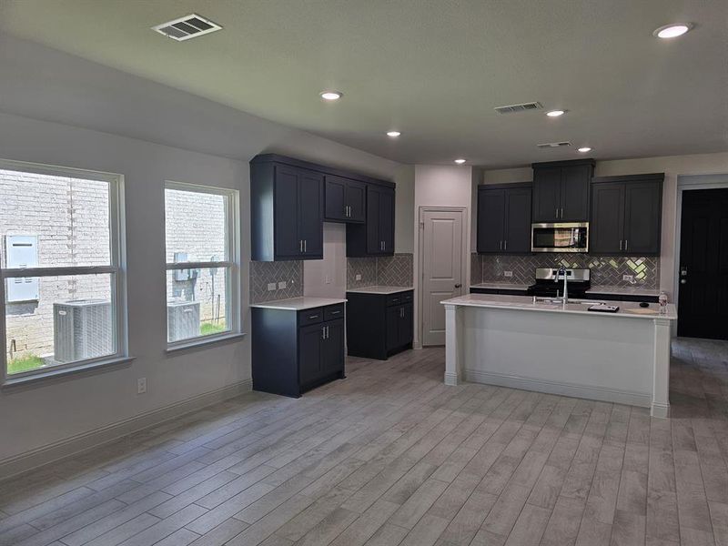 Furnished interior view inside a new home in , Anna (Image 12).