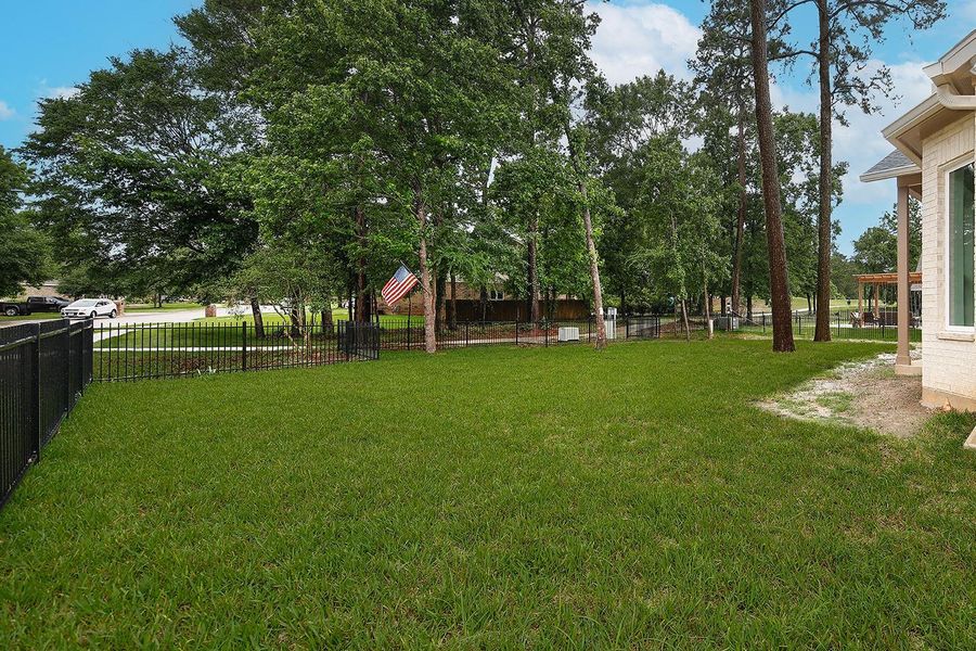 Exterior details and patio area of a home in , Conroe (Image 17).