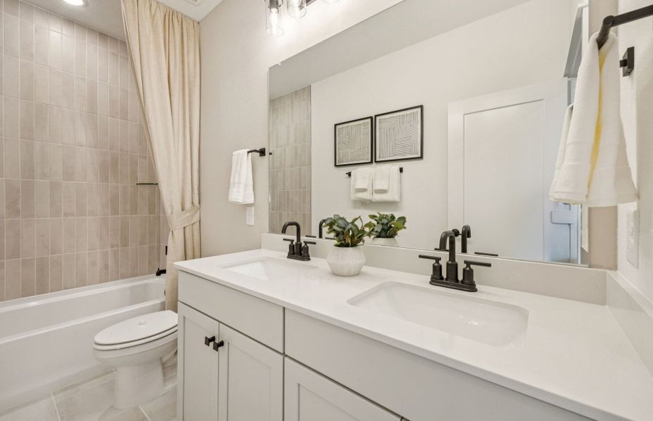 Representative furnished interior of a home built from the Rainier by Pulte Homes in Ribbonwood, Aubrey (Image 20).