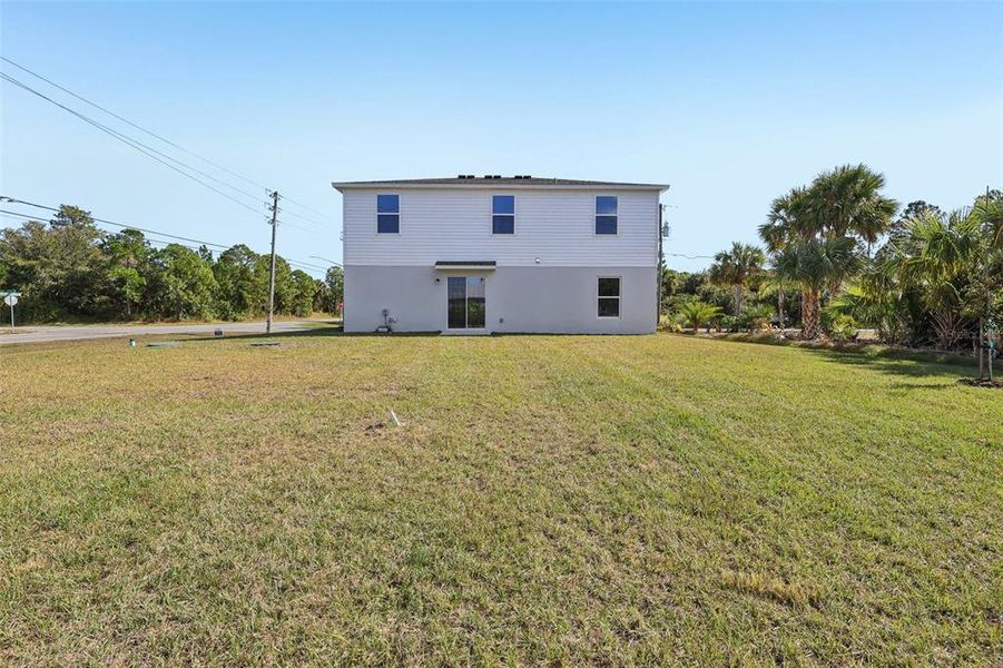 Exterior details and patio area of a home in Palm Bay Classic, Palm Bay (Image 8).