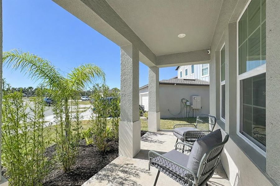 Exterior details and patio area of a home in Berry Bay: The Executives, Wimauma (Image 3).