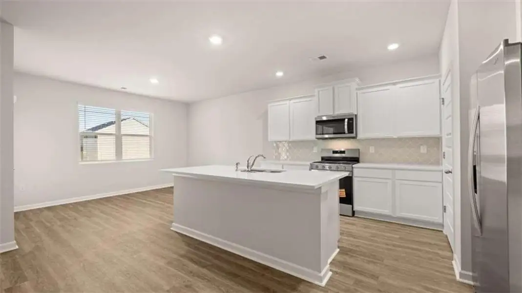 Furnished interior view inside a new home in Preserve at Dove Creek, Statham (Image 11).