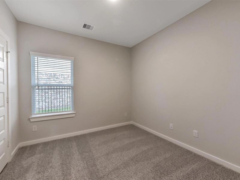 Spacious, unfurnished interior of a new home in Sunterra, Katy (Image 26).