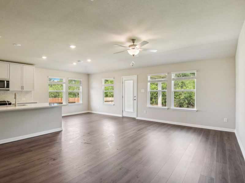 The open concept kitchen, living, and dining areas make for a great space to host.