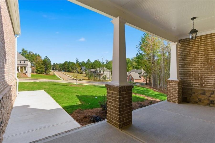 Exterior details and patio area of a home in The Estates at Hurricane Pointe, Douglasville (Image 4). Exterior details and patio area of a home in The Estates at Hurricane Pointe, Douglasville (Image 4).