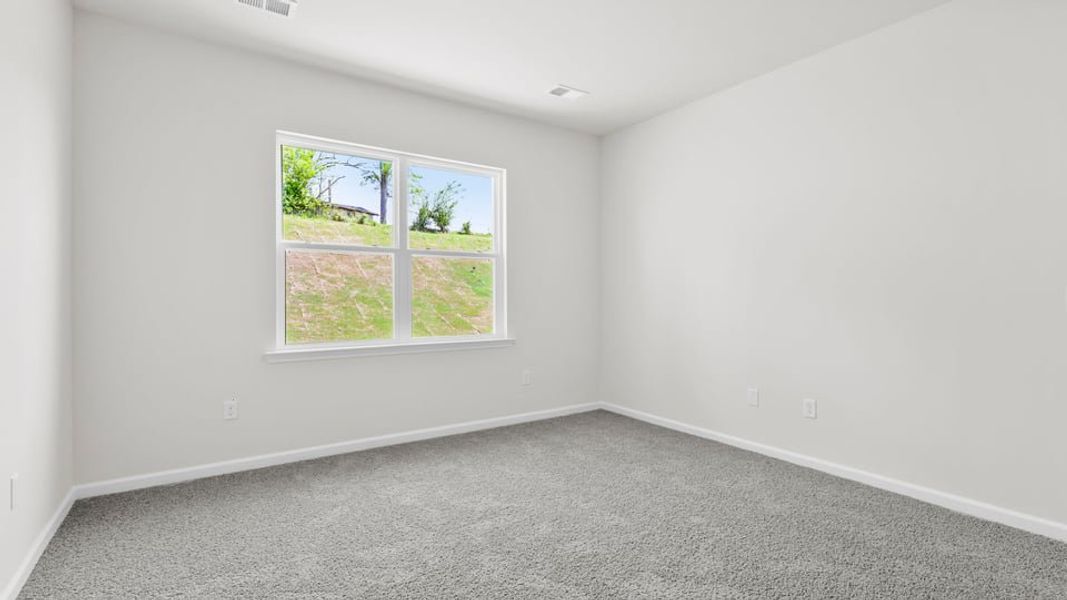 Spacious, unfurnished interior of a new home in Durbin Meadows Traditions, Fountain Inn (Image 26).