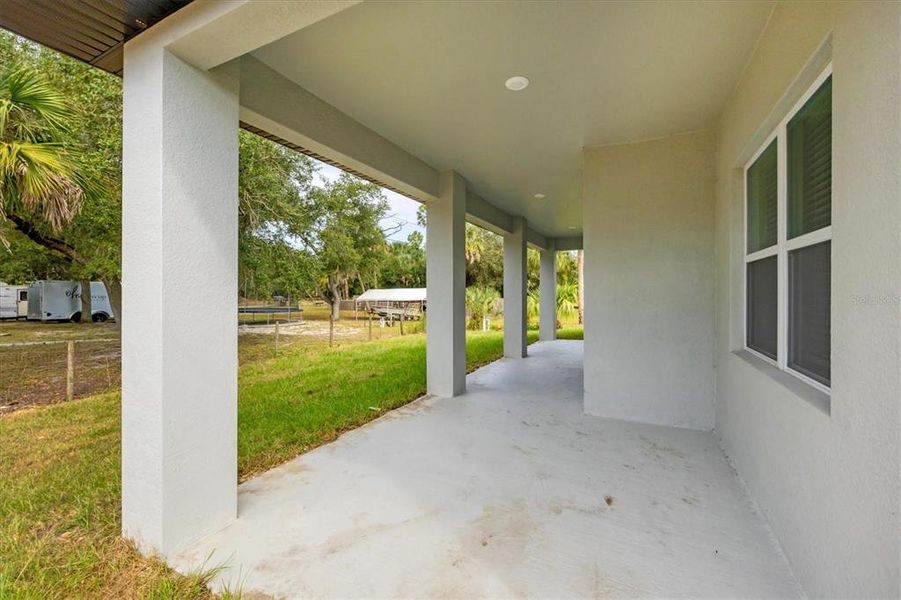 Exterior details and patio area of a home in , Port Charlotte (Image 3).