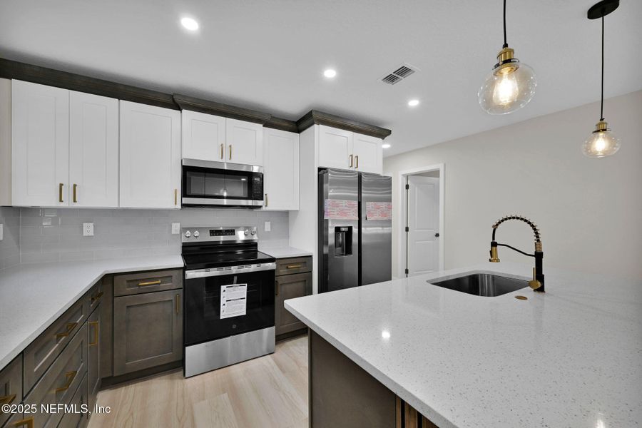 Furnished interior view inside a new home in , Jacksonville (Image 7). Furnished interior view inside a new home in , Jacksonville (Image 7).