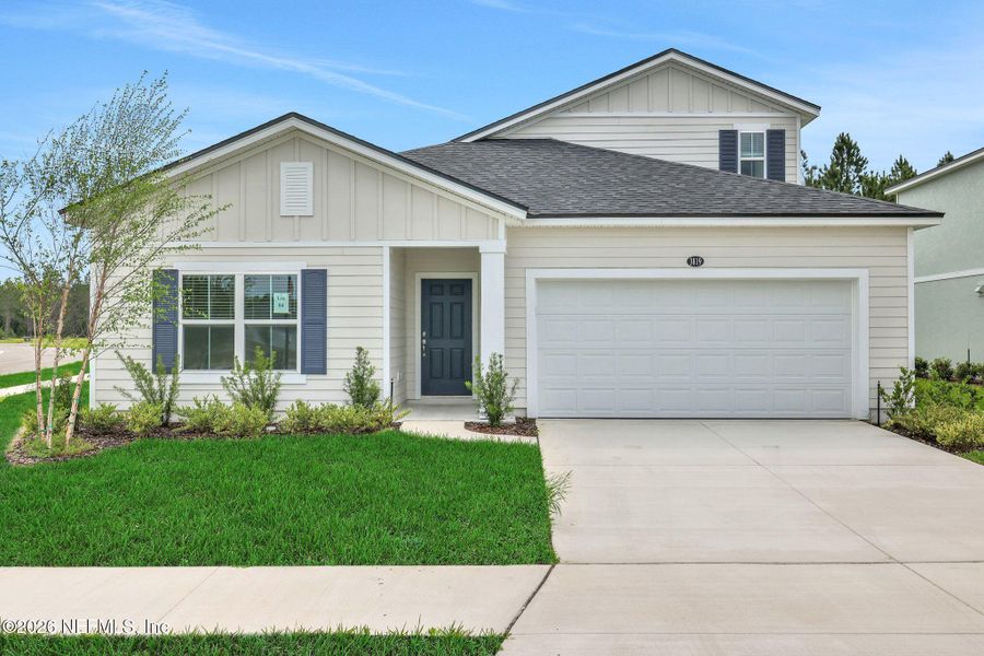 Front exterior of a new home in Amberly, Green Cove Springs, FL, highlighting curb appeal (Image 24).