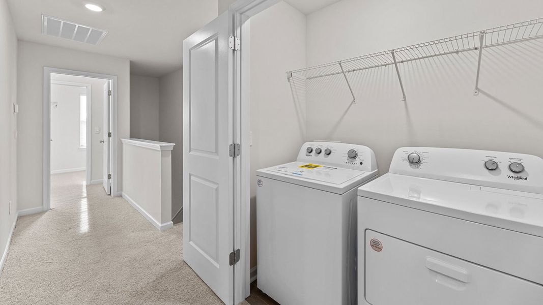 Furnished interior view inside a new home in The Townes at Ridgewood Farms, Winterville (Image 10).