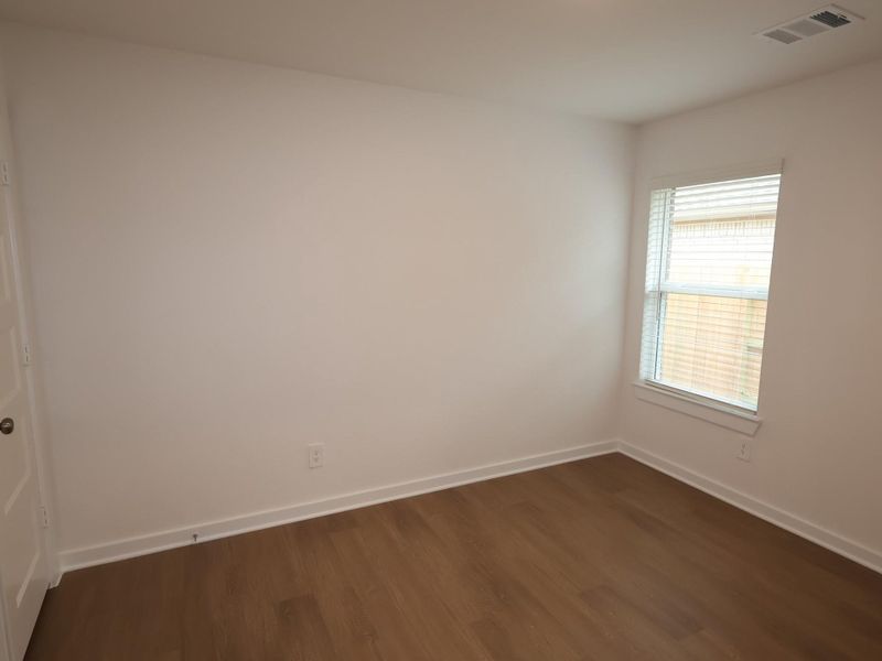 Spacious, unfurnished interior of a new home in Wildrye, Waller (Image 20).
