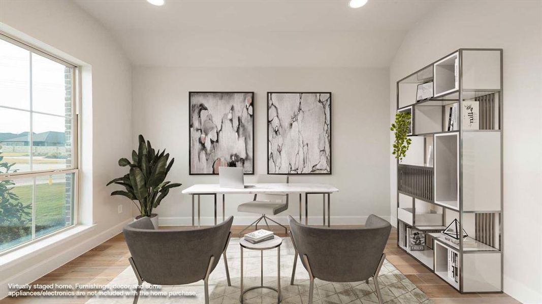 Office featuring light hardwood / wood-style floors and vaulted ceiling