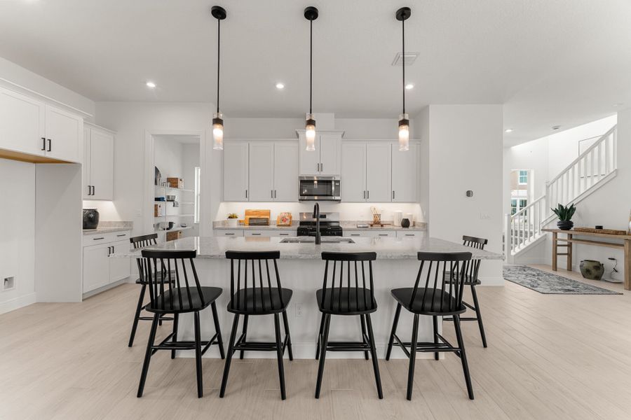 Representative furnished interior of a home built from the Dahlberg by Mattamy Homes in Newfield - Rosette Park, Palm City (Image 4).