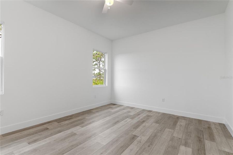 Spacious, unfurnished interior of a new home in , Port Charlotte (Image 28).