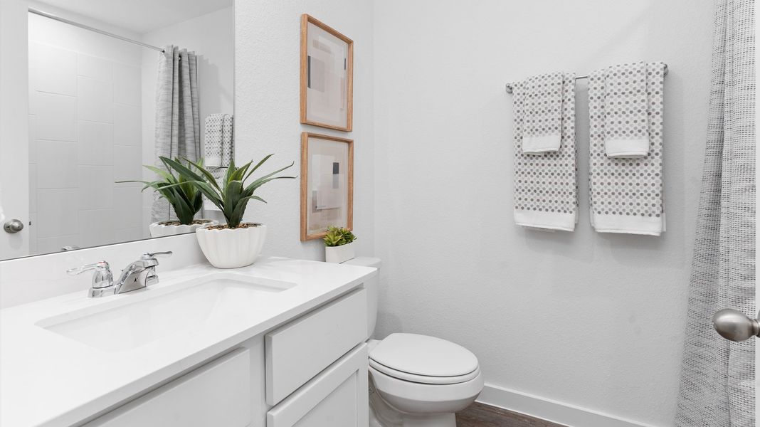 Representative furnished interior of a home built from the BOXWOOD by D.R. Horton in Legacy Village, Houston (Image 24).