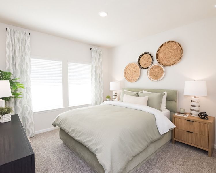 A full bedroom and bathroom on the main floor is perfect for hosting guests.