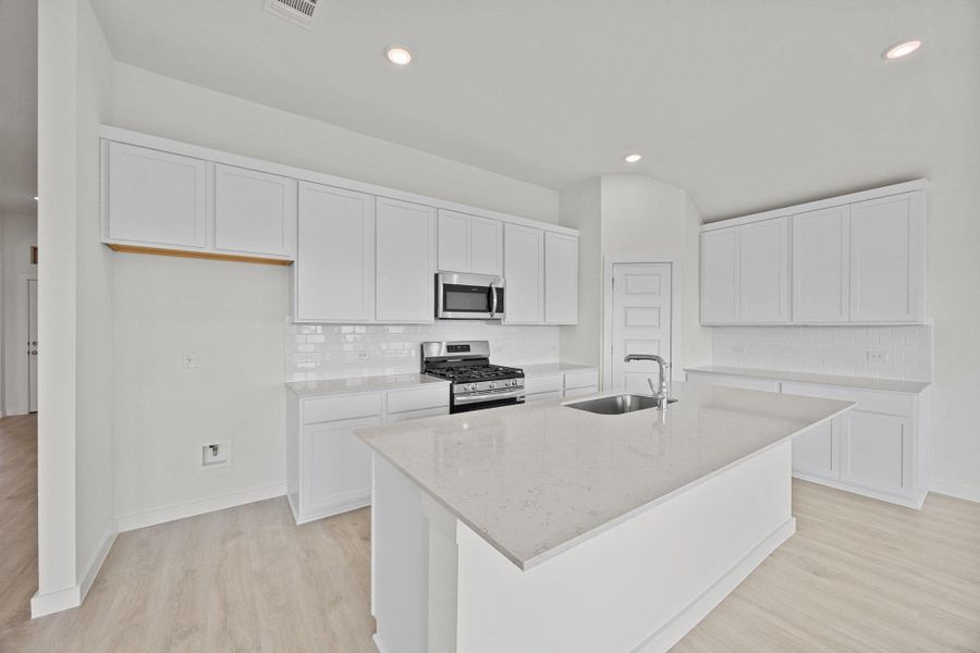 Furnished interior view inside a new home in Prairie Winds, Hutto (Image 7).