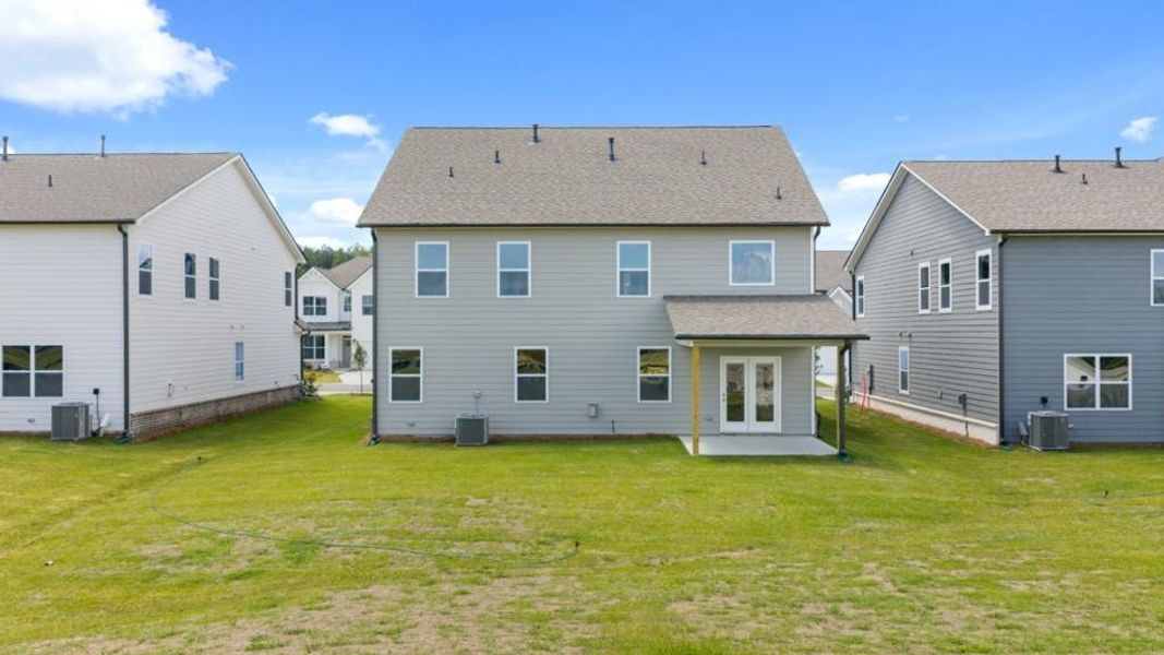 Front exterior of a new home in Hamptons at Riverwood East, Dallas, GA, highlighting curb appeal (Image 27).