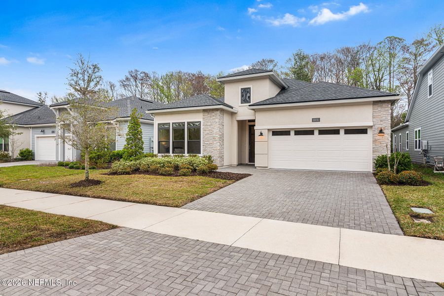 Front exterior of a new home in , Jacksonville, FL, highlighting curb appeal (Image 2).