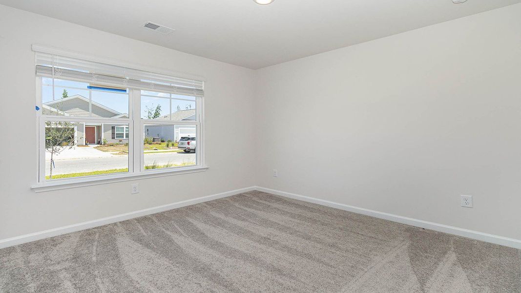 Representative unfurnished interior of a home built from the CALI by D.R. Horton in Heritage Crossing, Conway (Image 24).