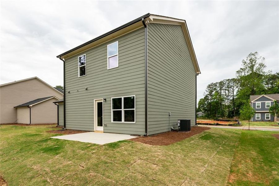 Front exterior of a new home in , Lawrenceville, GA, highlighting curb appeal (Image 15).