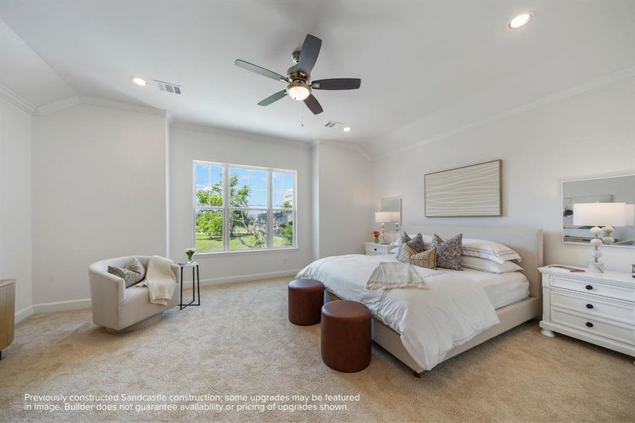 Primary Retreat: A spaciously lit sanctuary, complete with a ceiling fan for personalized comfort and views that take in Houston's scenic downtown facade.