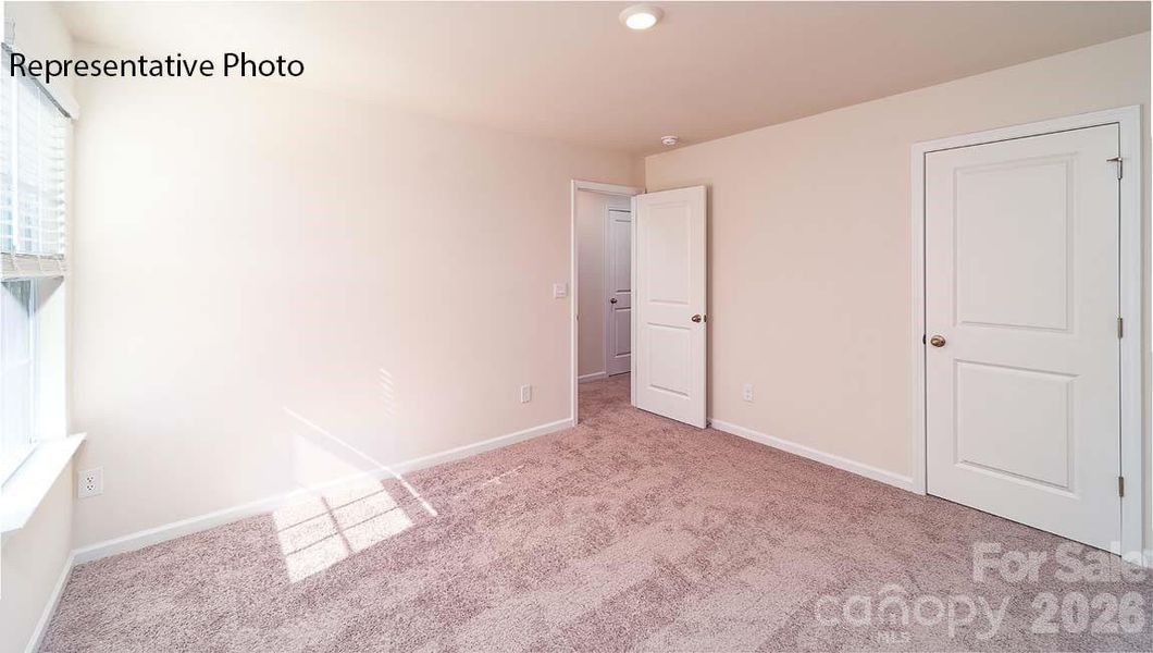 Spacious, unfurnished interior of a new home in Wallace Springs, Statesville (Image 31).