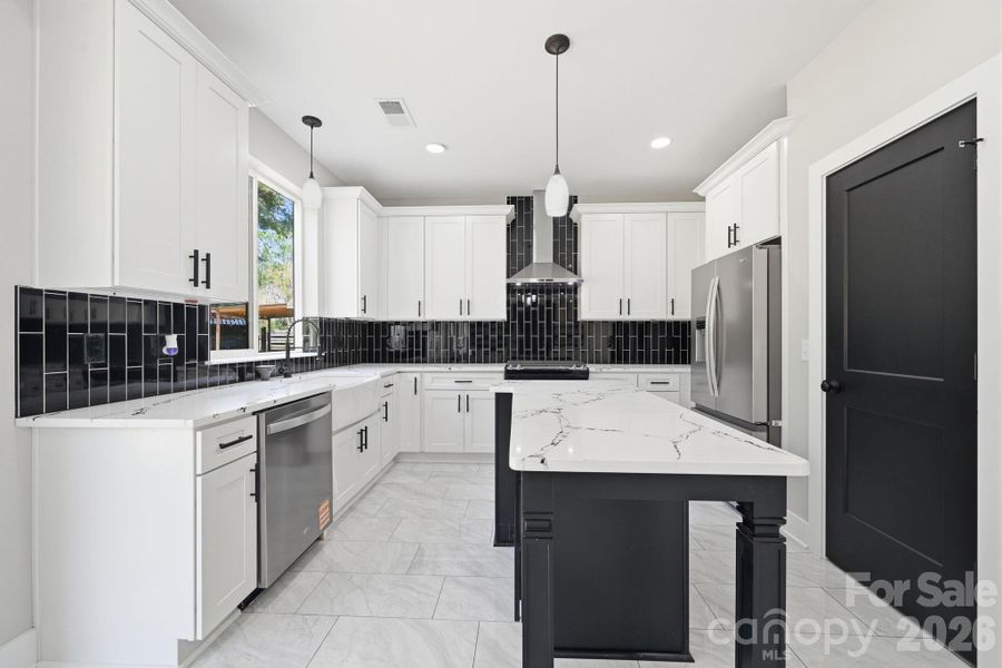 Furnished interior view inside a new home in , Huntersville (Image 6).