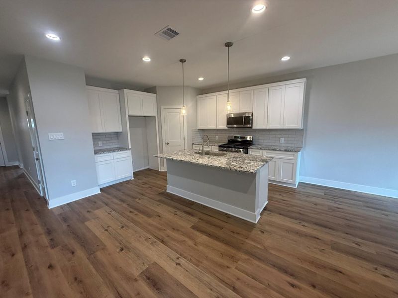 Furnished interior view inside a new home in , Dickinson (Image 4).