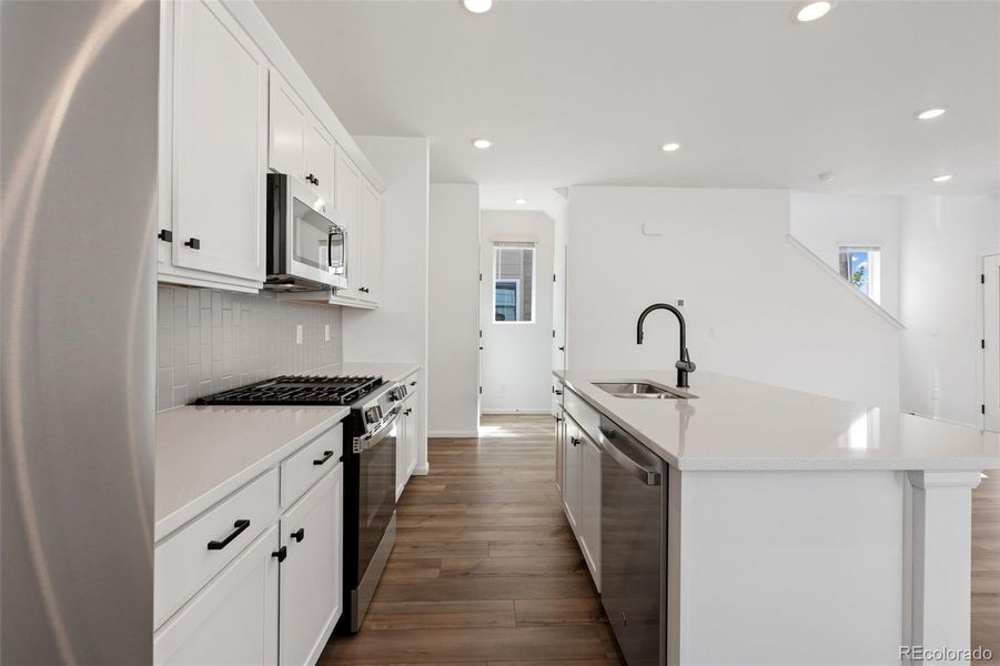Furnished interior view inside a new home in Woodrose at Painted Prairie, Aurora (Image 10).