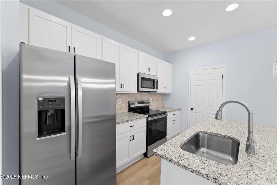 Furnished interior view inside a new home in , East Palatka (Image 6). Furnished interior view inside a new home in , East Palatka (Image 6).