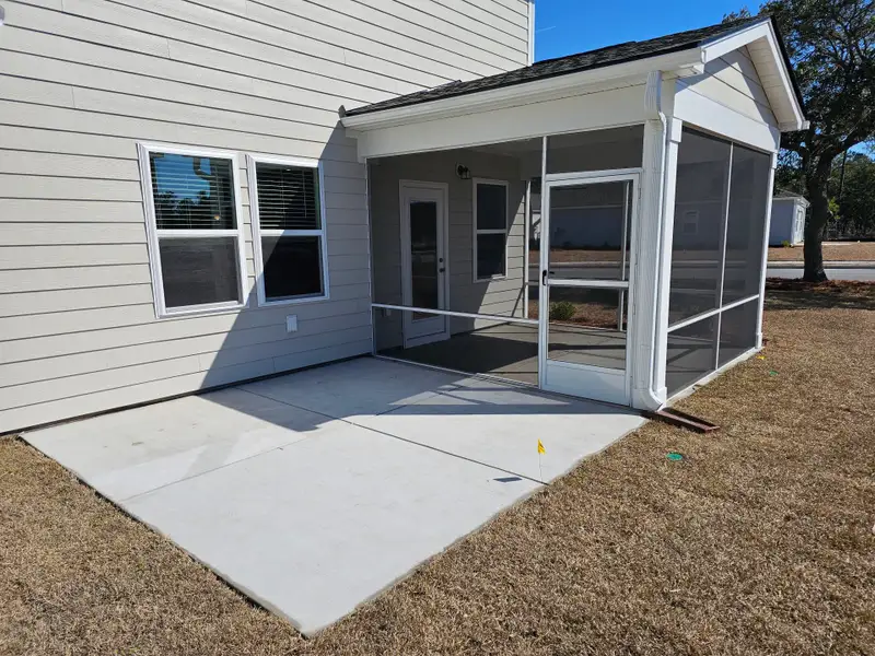 Exterior details and patio area of a home in Solserra, Shallotte (Image 3).