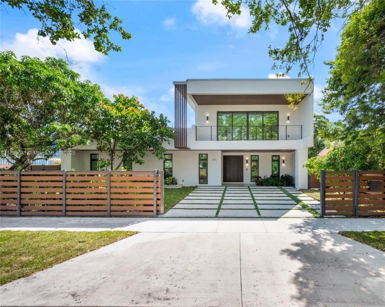 Front exterior of a new home in , Miami, FL, highlighting curb appeal (Image 1). Front exterior of a new home in , Miami, FL, highlighting curb appeal (Image 1).