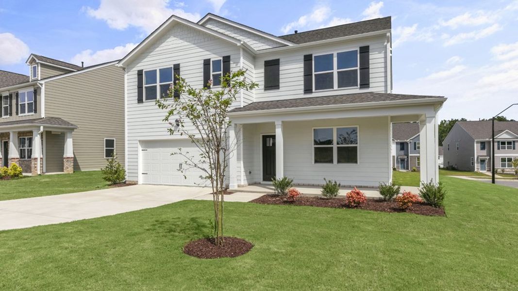 Front exterior of a new home in Beaver Dam Crossing, Bailey, NC, highlighting curb appeal (Image 1). Front exterior of a new home in Beaver Dam Crossing, Bailey, NC, highlighting curb appeal (Image 1).