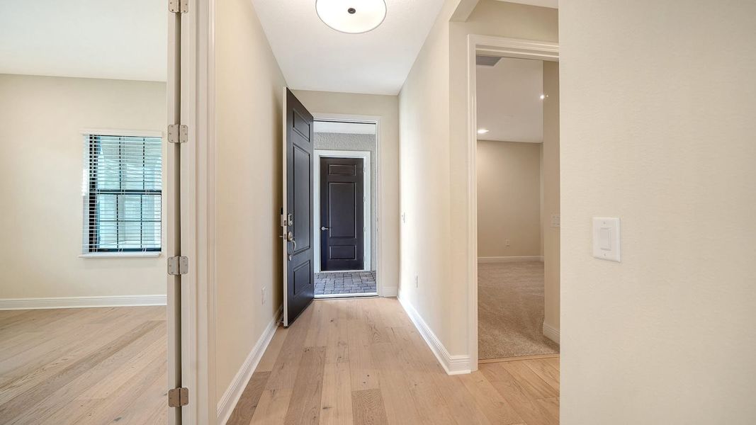 Spacious, unfurnished interior of a new home in Vistera of Venice Real Estate and Homes for Sale in Venice, FL - Neal Communities, Nokomis (Image 33).