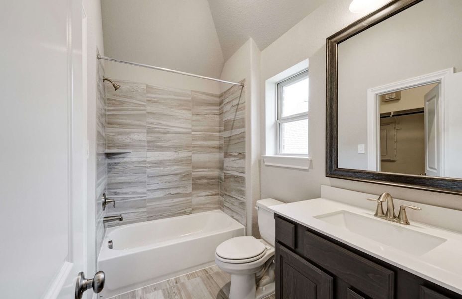 Representative furnished interior of a home built from the 2924 by Ravenna Homes in The Highlands 55′, Porter (Image 14). Representative furnished interior of a home built from the 2924 by Ravenna Homes in The Highlands 55′, Porter (Image 14).