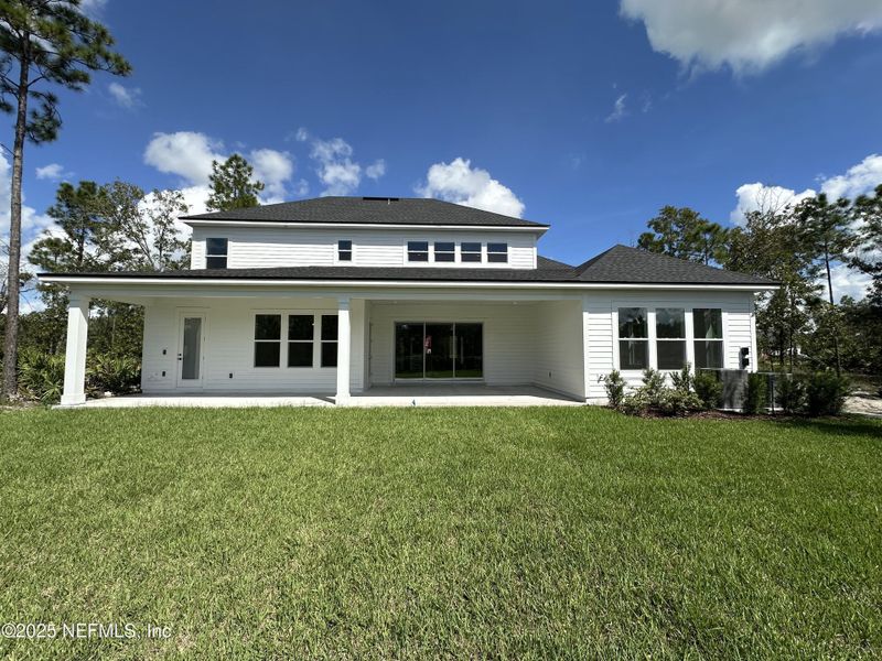 Exterior details and patio area of a home in SilverLeaf, St. Augustine (Image 3).