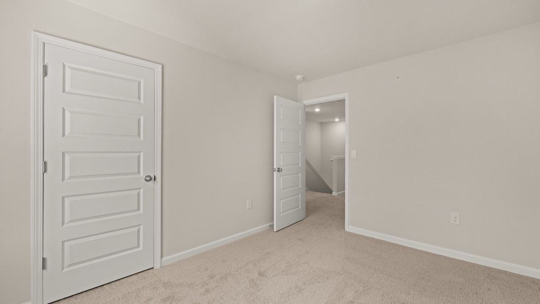 Representative unfurnished interior of a home built from the Salisbury by D.R. Horton in Echo Glen, Stockbridge (Image 29).