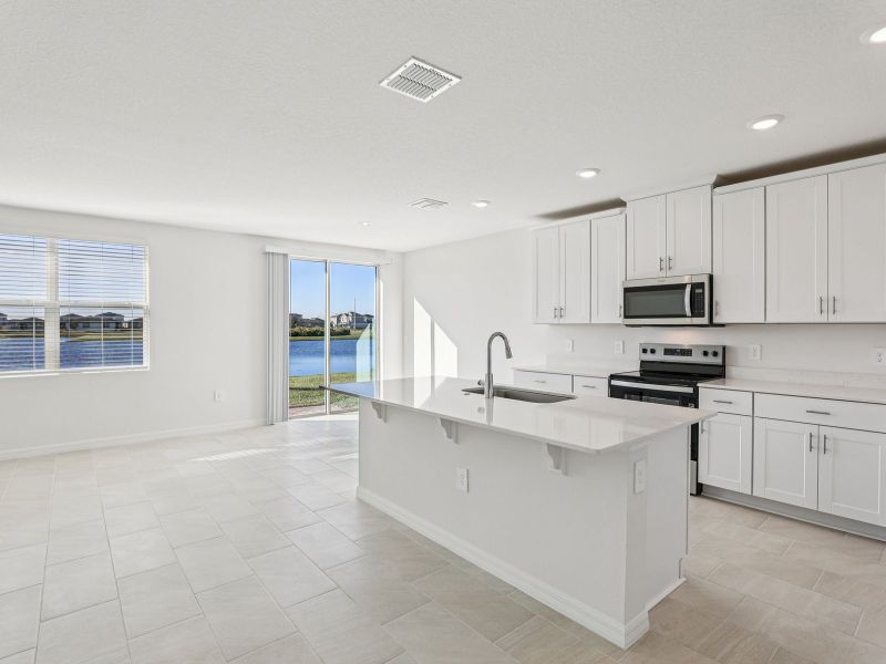 Furnished interior view inside a new home in Lake Deer Estates - Signature Series, Poinciana (Image 4).
