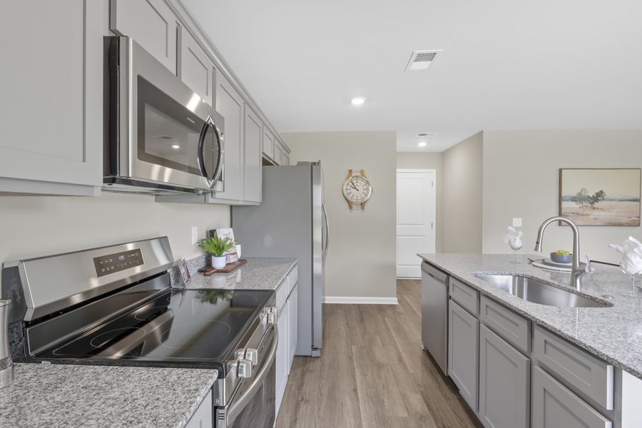 Representative furnished interior of a home built from the Myrtle A by McGuinn Homes in Willow Lake, Blythewood (Image 13).