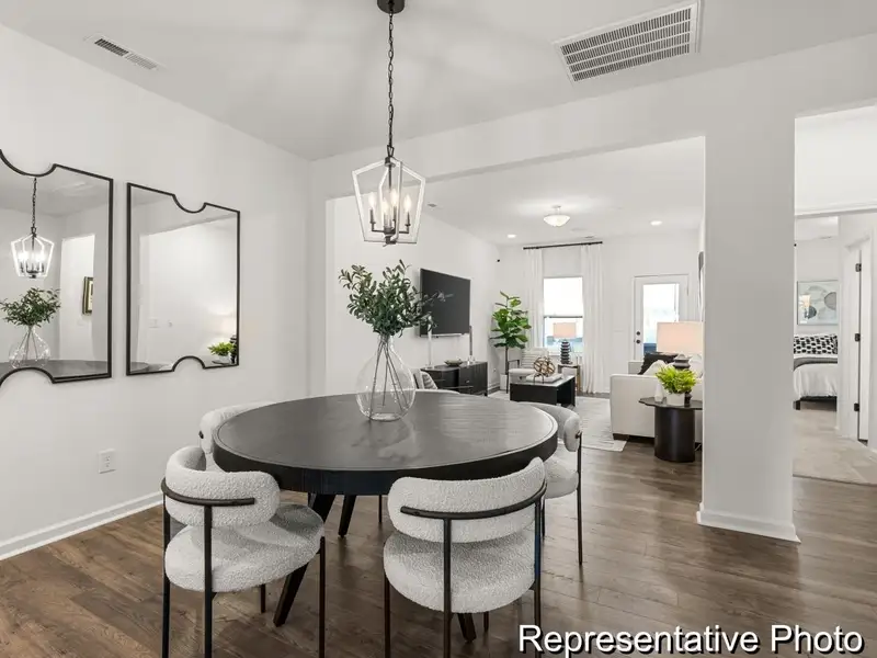 Furnished interior view inside a new home in North District at Flowers Plantation Townhomes, Clayton (Image 4). Furnished interior view inside a new home in North District at Flowers Plantation Townhomes, Clayton (Image 4).