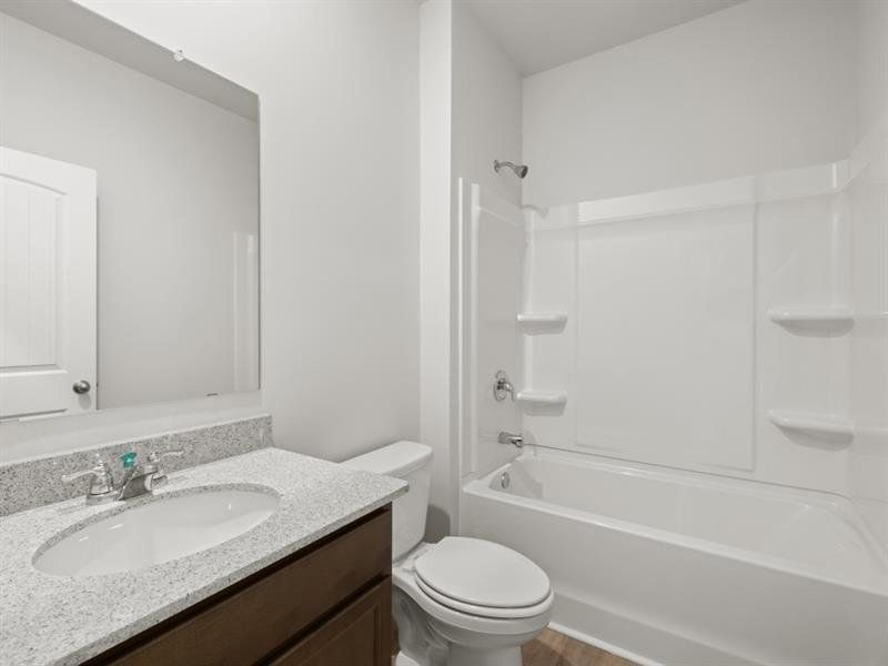 Furnished interior view inside a new home in Lost Creek, Dallas (Image 15).