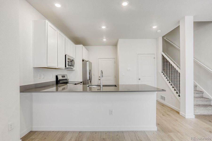 Furnished interior view inside a new home in Parterre, Thornton (Image 6).